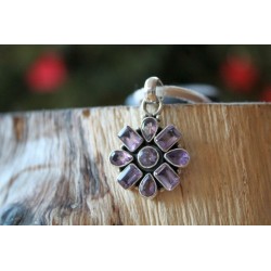 Silver pendant in flower shape with amethyst
