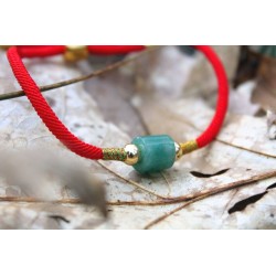 Jade bracelet in red grounding and meditation