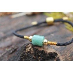 Jade bracelet in black grounding and meditation