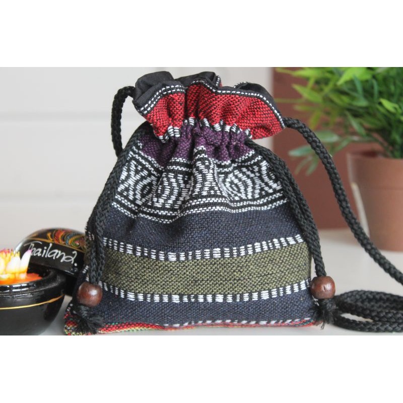 Auch die Farbe der beiden Holzperlen kann von den Fotos abweichen.